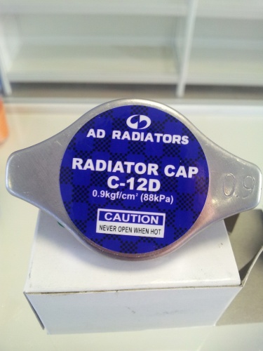 Крышка радиатора 0,9 kg/cm2 - 88 kPa, D=44mm, d=26mm C-12D, R125 узкий клапан (AD)